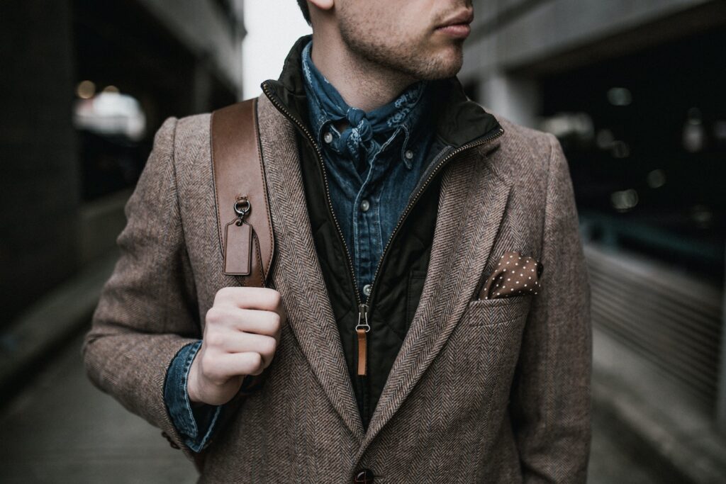 Photo Of Man Wearing Brown Coat